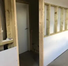 wall and doorway being built